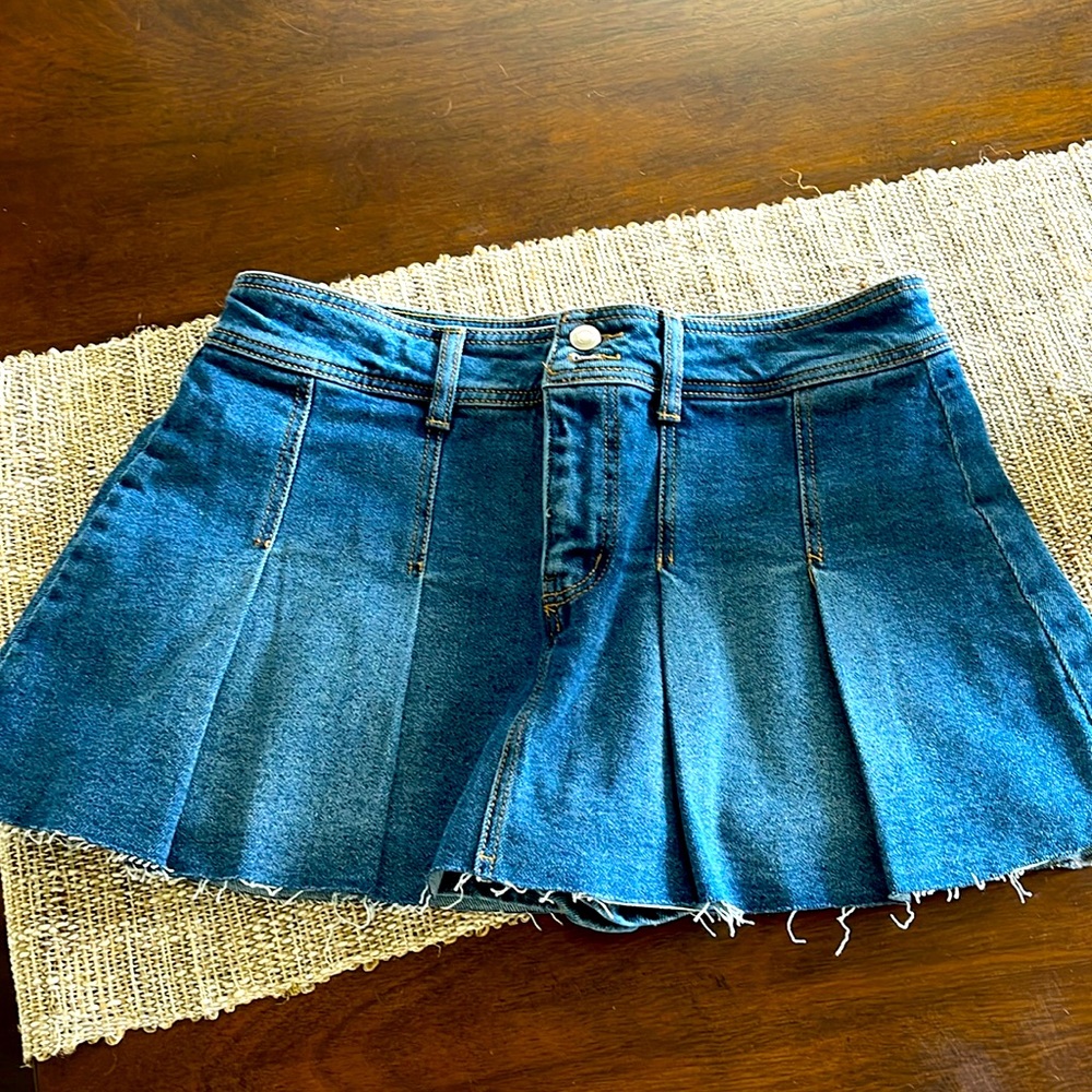 Adorable denim skort. NWT never worn! From Dillards.